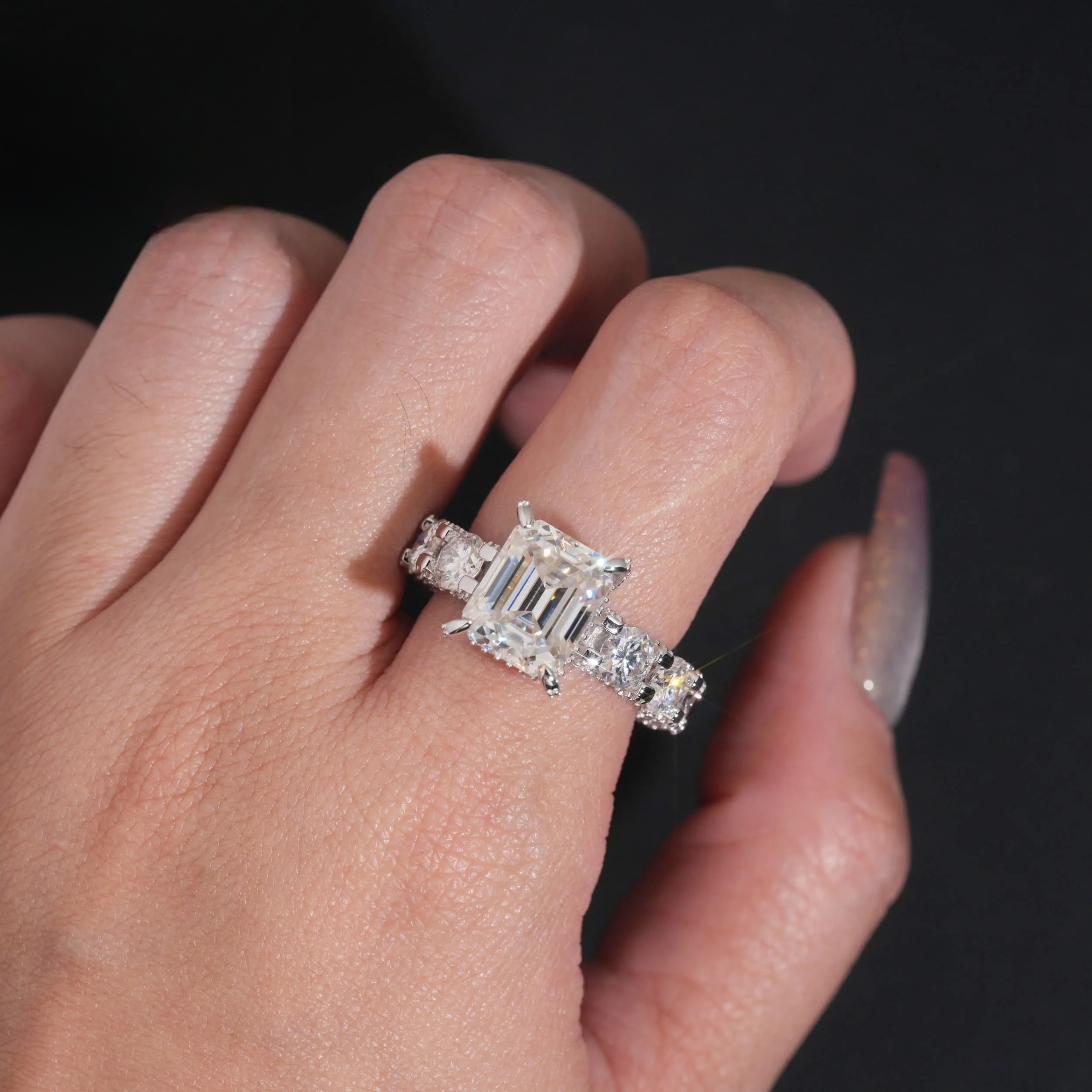 emerald cut moissanite ring in 925 sterling silver band